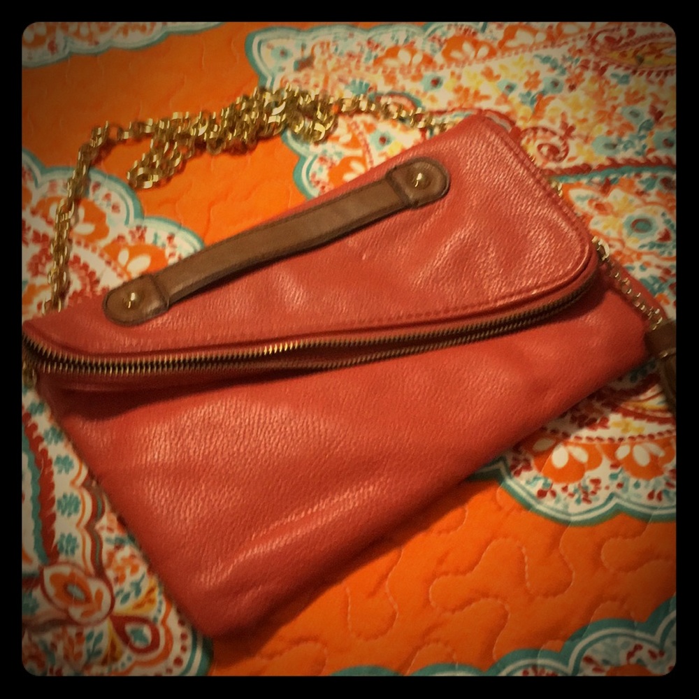 Salmon colored cross body purse/clutch